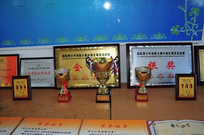 科技示范校驗(yàn)收 以評(píng)促建，譜寫我校文教科技開發(fā)新篇章